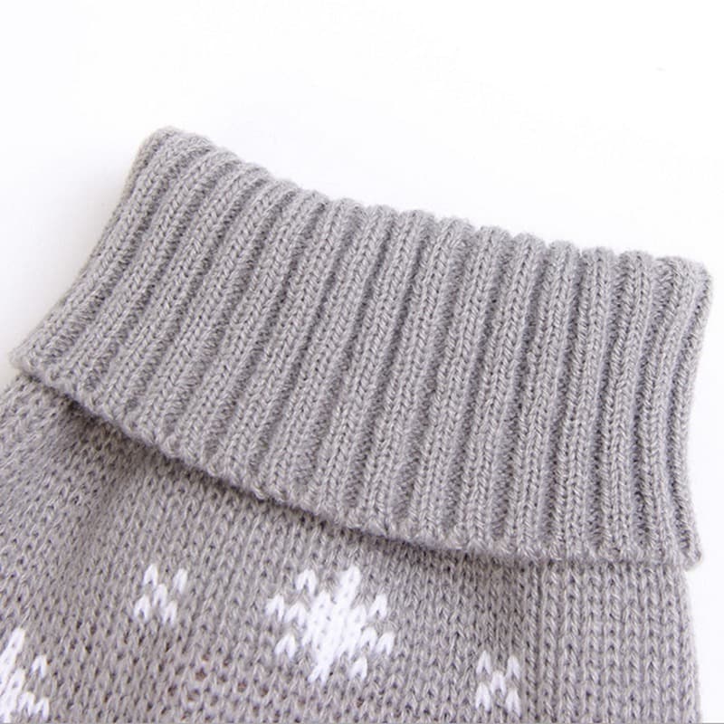 Close-up of the ribbed turtleneck on a gray pet sweater