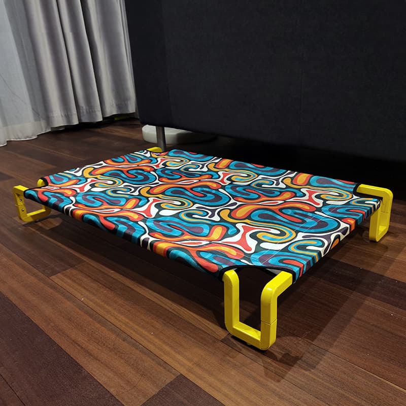 Colorful elevated cooling dog cot with yellow frame